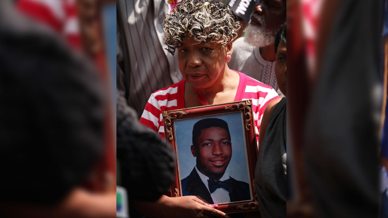 Gwen Carr, mother of Eric Garner, protesting with family members of victims killed by police. (Photo: Getty)