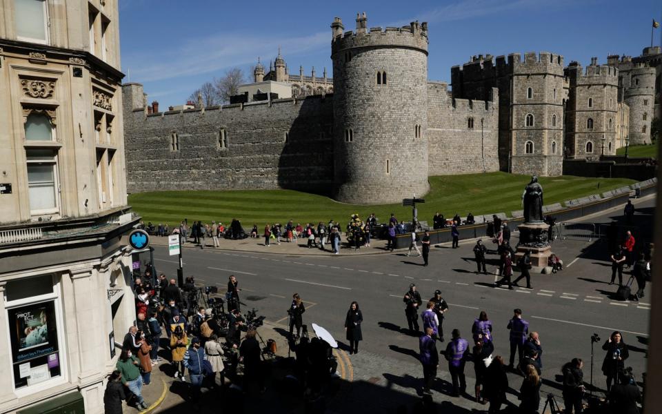 Mourners gather ahead of the funeral of Prince Philip - Matt Dunham/AP