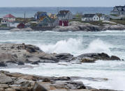 Waves batter the shore in Peggy's Cove, N.S., on Wednesday, Sept. 23, 2020. Hurricane Teddy has impacted the Atlantic region as a post-tropical storm, bringing rain, wind and high waves. (Andrew Vaughan/The Canadian Press via AP)