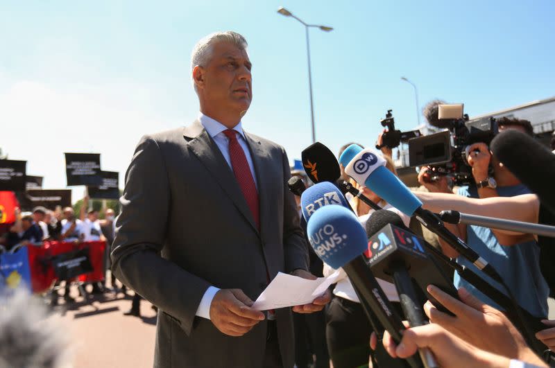 Kosovo's President Hashim Thaci speaks to members of the media before being interviewed by war crimes prosecutors after being indicted by a special tribunal, in The Hague