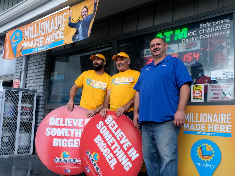 Joe Chahayed, center, is owner of Joes Service Center, a Mobil gas station at Woodbury Road and Fair Oaks Avenue in Altadena that sold the $2.04 billion-winning Powerball ticket. His sons, Danny, left, and Joe Jr. are next to him on Tuesday, Nov. 8, 2022.