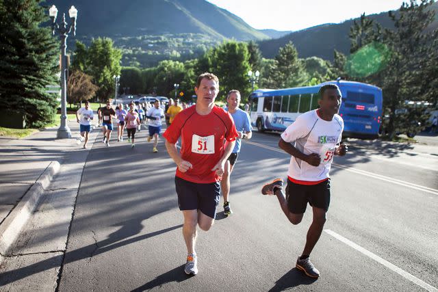 <p>Huge Galdones</p> Bobby Flay, Marcus Samuelsson, and Danny Meyer compete in a 5K race for charity