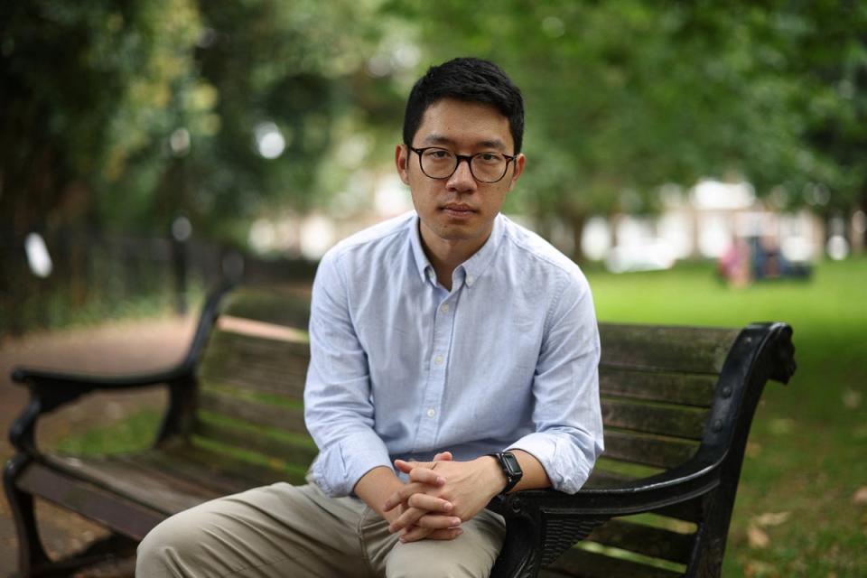 In this picture taken on 18 August 2023, former Hong Kong legislator and pro-democracy activist Nathan Law poses for a photograph in London (AFP via Getty Images)