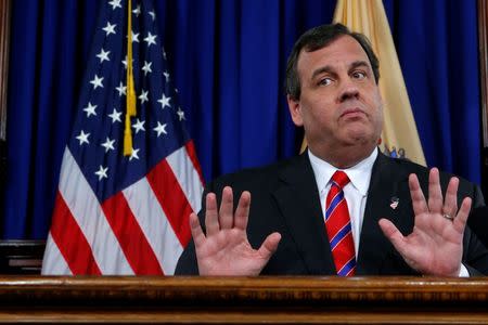 New Jersey Governor Chris Christie reacts to a question during a news conference in Trenton, New Jersey, U.S. on March 28, 2014. REUTERS/Eduardo Munoz/File Photo