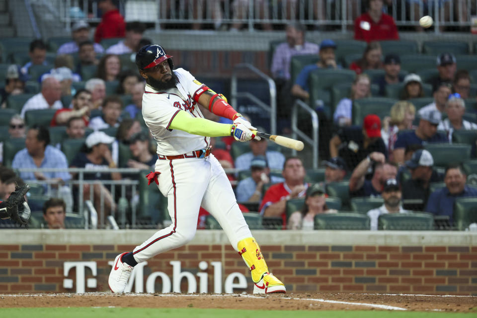 Atlanta Braves' Marcell Ozuna (20) hits a solo home run against the Boston Red Sox during the third inning of a baseball game Wednesday, May 8, 2024, in Atlanta. (Jason Getz/Atlanta Journal-Constitution via AP)