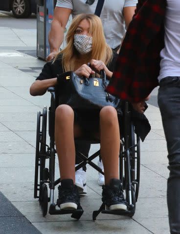 <p>BACKGRID</p> Wendy Williams being pushed in a wheelchair in 2021