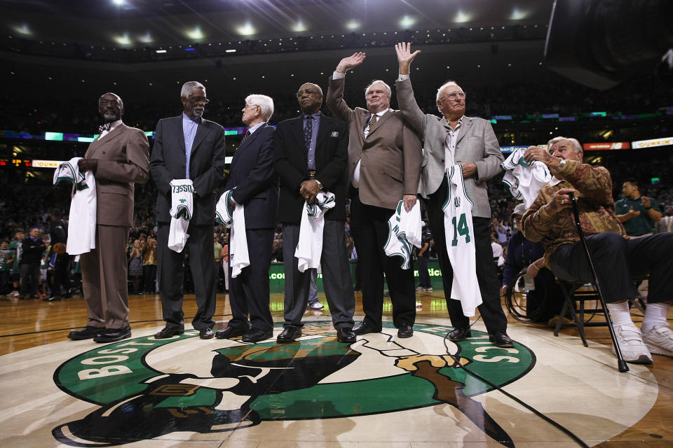 BOSTON, MA - APRIL 18: Members of the '62 Celtics team from left, Tom Sanders, Bill Russell, Frank Ramsey, Sam Jones, Tom Heinsohn, Bob Cousy, and Jim Loscutoff are honored on the 50th anniversary of Boston's game 7 win over the Los Angeles Lakers to win an NBA championship, at the TD Garden during half time.  The Boston Celtics play the Orlando Magic at the TD Garden during a regular season NBA game in Boston, MA on April 18, 2012. (Photo by Yoon S. Byun/The Boston Globe via Getty Images)