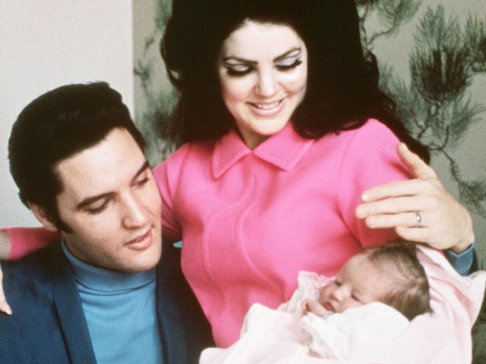 Elvis Presley and his wife, Priscilla, prepare to leave the hospital with their new daughter, Lisa Marie. Memphis, Tennessee, February 5, 1968.