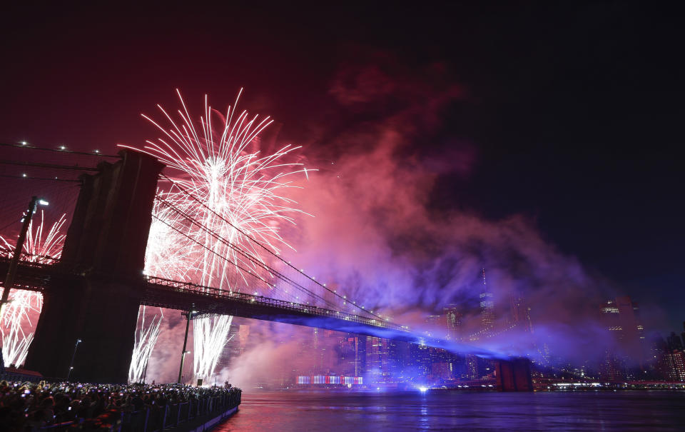Fireworks light up the sky above the Brooklyn Bridge during Macy's Fourth of July fireworks show Thursday, July 4, 2019, in New York. (AP Photo/Frank Franklin II)