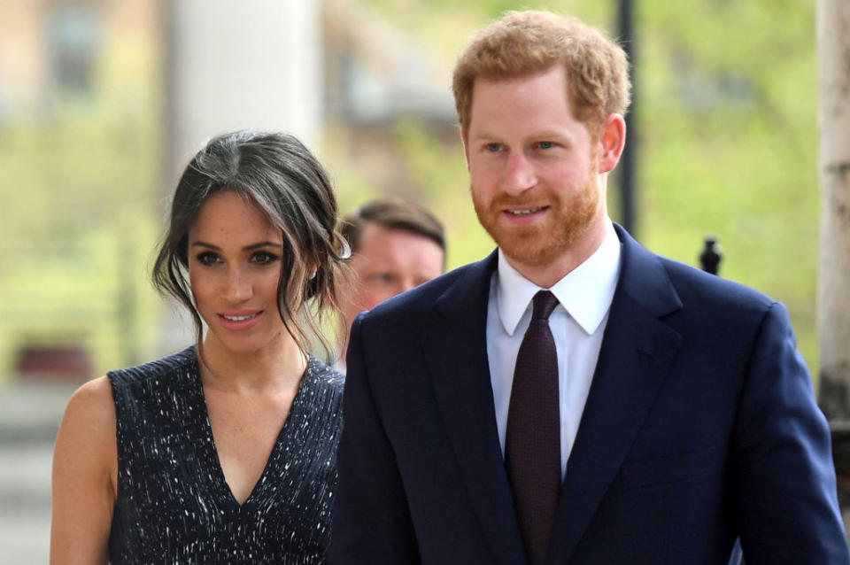 Meghan and Harry standing together