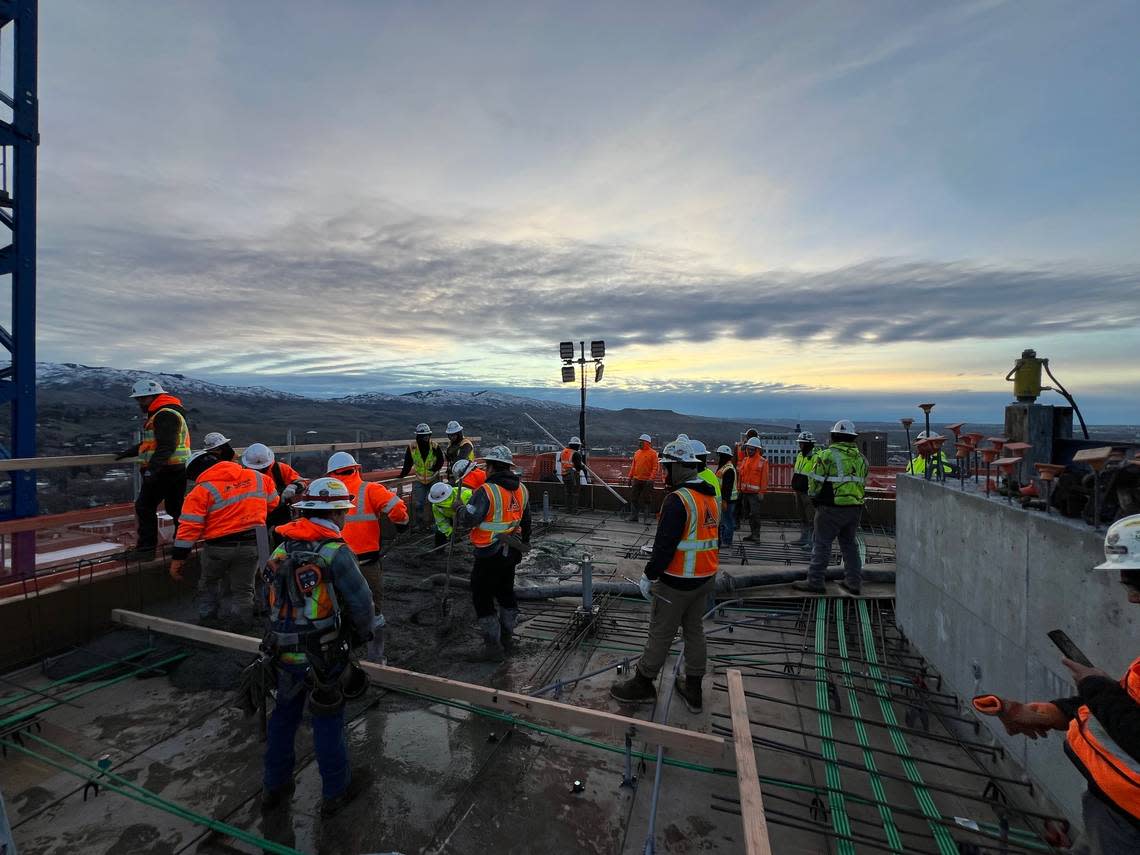 Laborers on the Arthur work on the roof on Feb. 5 as they finish vertical construction. Courtesy of Oppenheimer Development Corp.