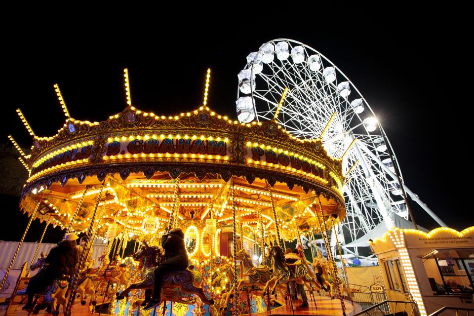 The carousel and big wheel outside the castle grounds. The market returning after being cancelled the previous year due to Covid 19 is one of the largest Christmas markets in Europe. Centred in and around the catle and the Cathedral in the Bailgate area of Lincoln the markets draws visitors from all over Europe.