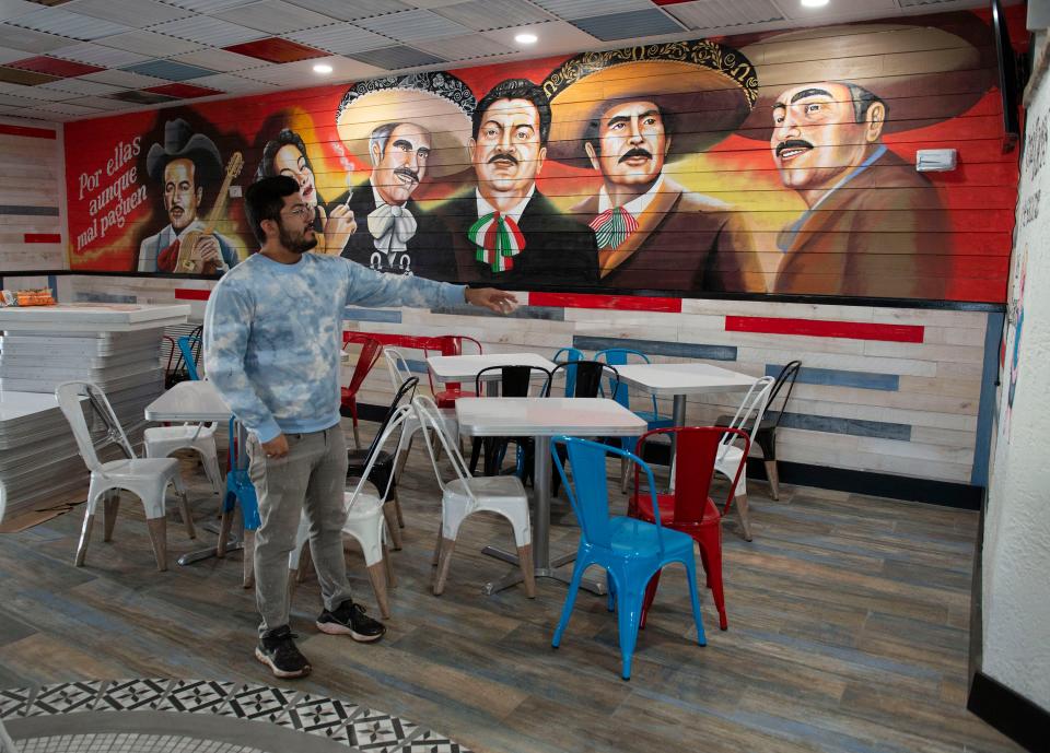 Leonardo Morales shows off the interior spaces of the new Papa's Tacos on Olive Road.