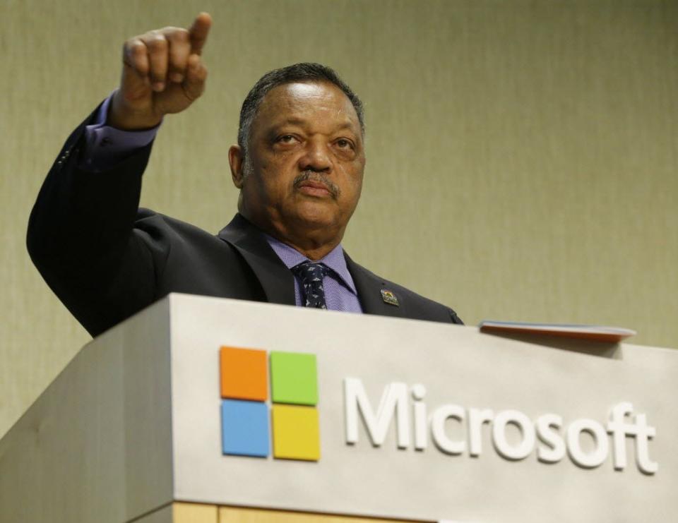 Jesse Jackson addresses Microsoft executives, one of many such meetings in recent months as his Rainbow/PUSH coalition tackles the issue of diversity hiring in Silicon Valley.