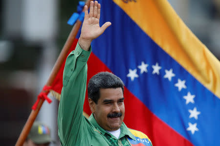 Venezuela's President Nicolas Maduro gestures during a campaign rally in Caracas, Venezuela May 17, 2018. REUTERS/Carlos Garcia Rawlins