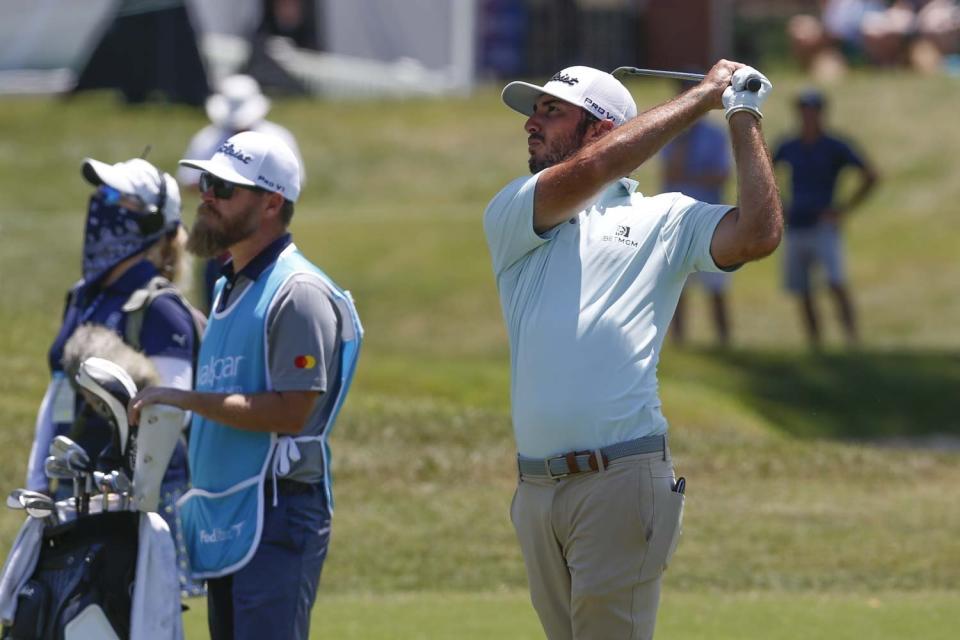 Max Homa, right, looks for the ball after a shot at the ninth hole during the PGA Valspar Championship golf tournament in Palm Harbor, Fla., Friday, April 30, 2021. (Ivy Ceballo/Tampa Bay Times via AP)