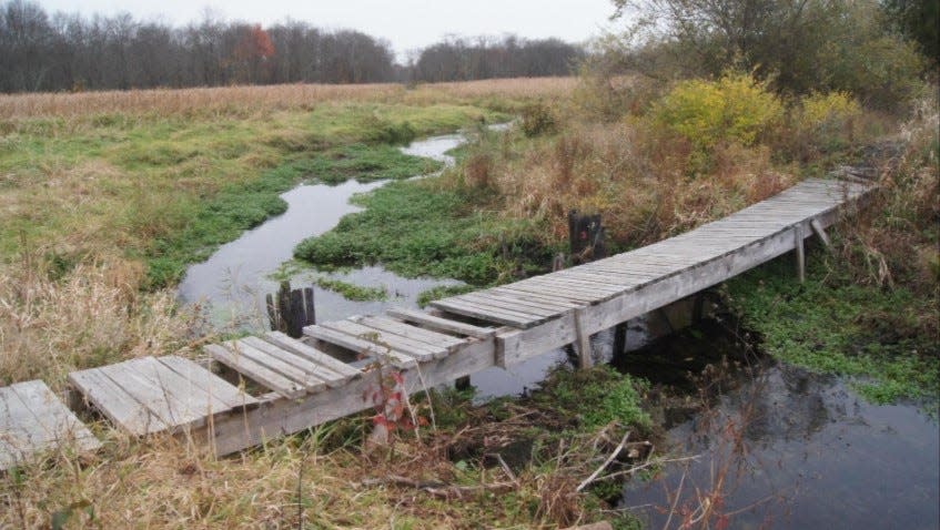 The Sussex Branch Trail follows a 20-mile path along the old Sussex Mine Railroad line. This wooden bridge, above. is seen along the Newton portion of the trail.