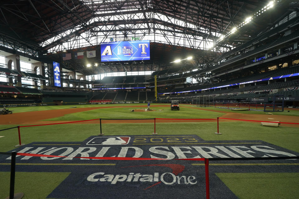 Signage is seen near the infield at Globe Life Field ahead of the World Series between the Texas Rangers and the Arizona Diamondbacks, Wednesday, Oct. 25, 2023, in Arlington, Texas. (AP Photo/Julio Cortez)