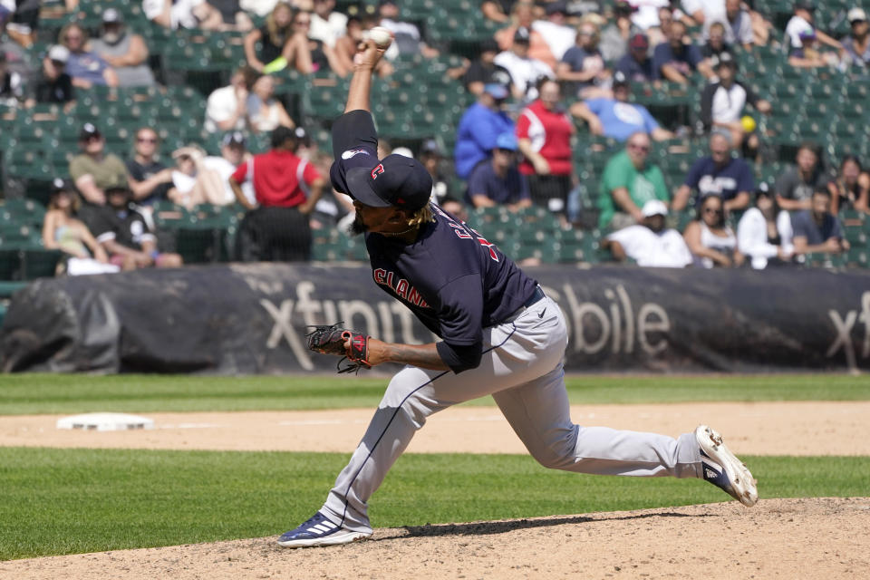 Cleveland Guardians relief pitcher Emmanuel Clase delivers during the ninth inning of the first game of a baseball doubleheader against the Chicago White Sox, Saturday, July 23, 2022, in Chicago. (AP Photo/Charles Rex Arbogast)