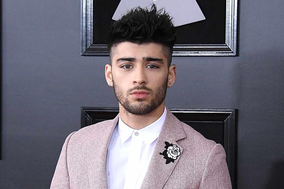 <p>Steve Granitz/Getty</p> Zayn Malik opens up about fatherhood in a rare interview with the "Call Her Daddy" podcast.