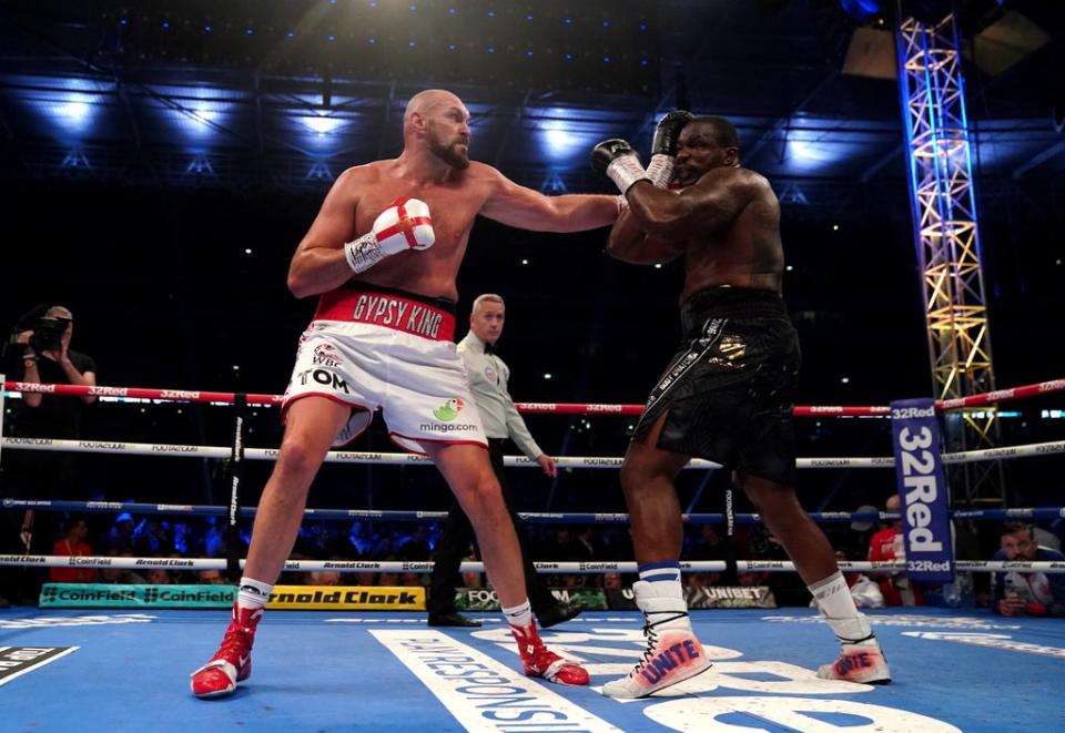 Tyson Fury, left, stopped Dillian Whyte in the sixth round of their world heavyweight title bout (Nick Potts/PA) (PA Wire)
