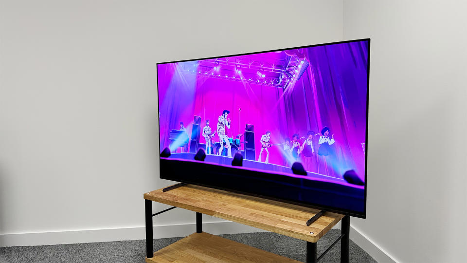 55-inch Sony A80L on a wooden stand with an image from animated TV show Agent Elvis on the screen