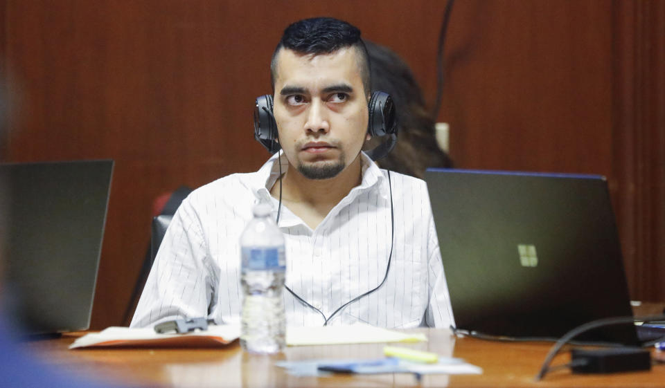 Cristhian Bahena Rivera listens his murder trial at the Scott County Courthouse in Davenport, Iowa, on Wednesday, May 19, 2021. Rivera is charged with first-degree murder in the death of Mollie Tibbetts. (Jim Slosiarek/The Gazette via AP, Pool)