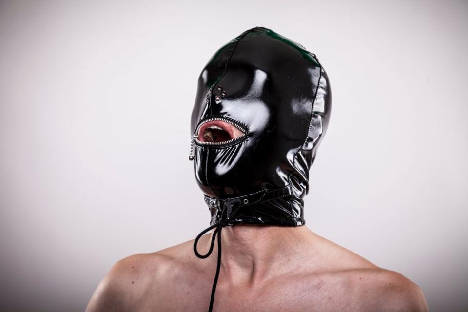 man with a leather mask