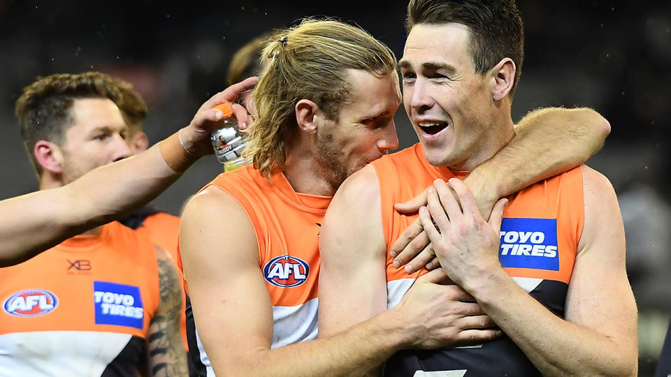 Jeremy Cameron is pictured with GWS Giants teammate Nick Haynes.