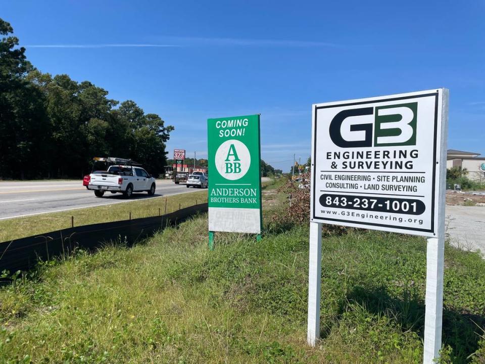 A sign announcing the new location of an Anderson Brothers Bank in Carolina Forest. The new business is part of a wave of projects coming to the growing area.