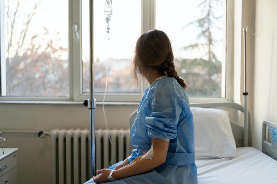 Cancer can be a traumatic experience. <a href="https://www.gettyimages.com/detail/photo/patient-woman-in-hospital-room-royalty-free-image/1468190611" rel="nofollow noopener" target="_blank" data-ylk="slk:aquaArts studio/E+ via Getty Images;elm:context_link;itc:0;sec:content-canvas" class="link ">aquaArts studio/E+ via Getty Images</a>