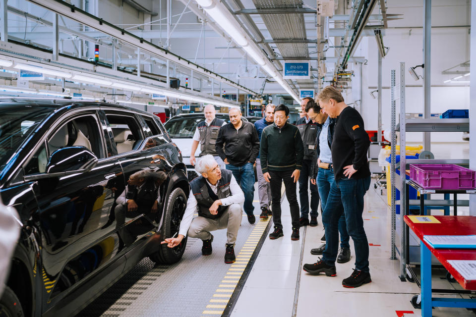 Ocean inspects the SUV at Fisker's factory.