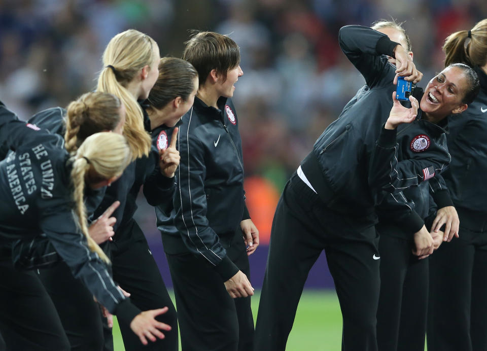 LONDON, ENGLAND - AUGUST 09: The United States women's soccer team poses for a photo after defeating Japan by a score of 2-1 to win the Women's Football gold medal match on Day 13 of the London 2012 Olympic Games at Wembley Stadium on August 9, 2012 in London, England. (Photo by Julian Finney/Getty Images)