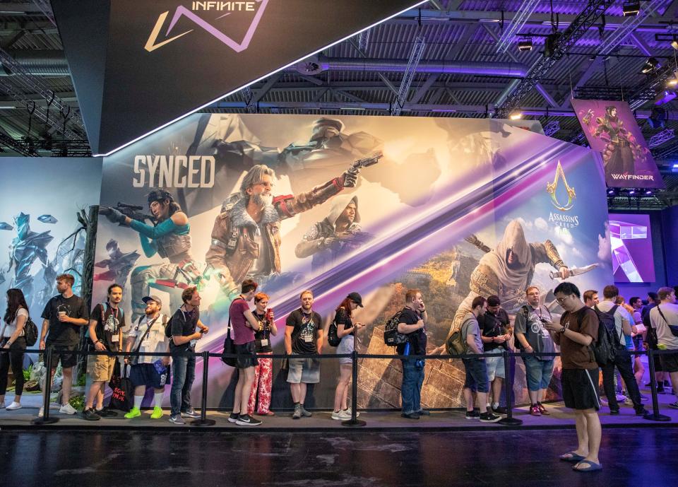 People wait in line to try games at the booth of Tencent during gamescom 2023 in Cologne, Germany, Aug. 23, 2023. The 2023 edition of the international computer and video games trade fair gamescom opened on Wednesday in Cologne, western Germany. Chinese companies displayed their products on the trade fair.   According to the Koelnmesse, organizer of the week-long event, gamescom is the world's largest trade fair for computer and video games in terms of space and visitors. (Photo by Zhang Fan/Xinhua via Getty Images)