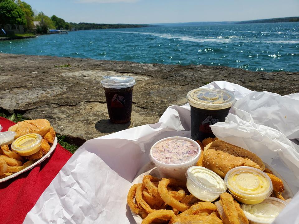 A fried fish sandwich and onion rings meal from Doug's Fish Fry in Skaneateles, New York.