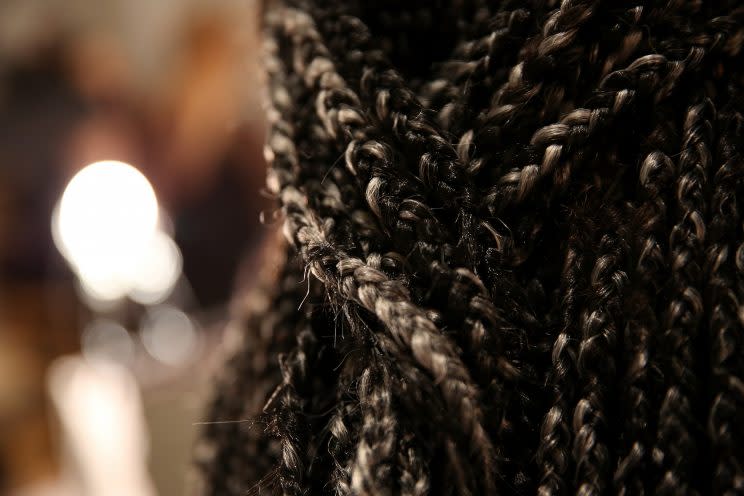 Detailed shot of the black and gray braids at Pyer Moss.