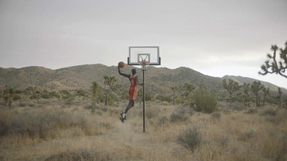 This is a still photo from the documentary "Amongst the Trees," a film about the basketball team at tiny Copper Mountain College directed by Jack Jensen and Trent Ubben. The film is screening Saturday at the Palm Springs International Film Festival.