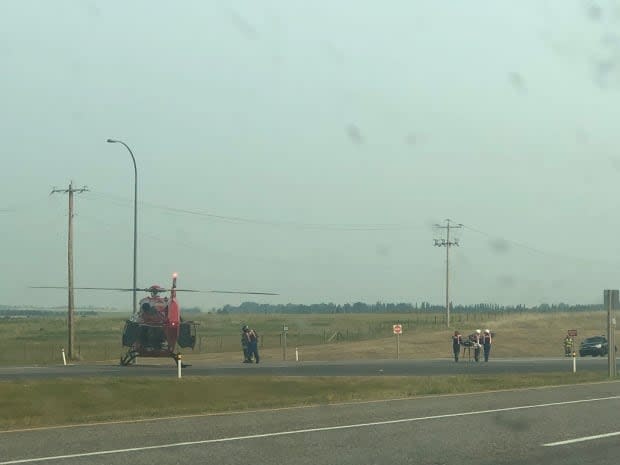 A vehicle was crossing Highway 2 near Okotoks, Alta., when it was T-boned by a southbound vehicle. (Elise von Scheel - image credit)