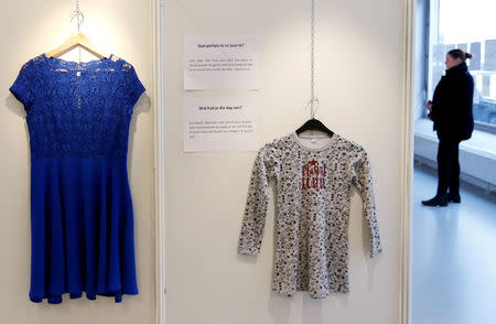 Clothes are displayed at the exhibition "What Were You Wearing?" that showcases the stories of U.S. student rape victims through representations of the outfits they wore during their assault, in the Brussels district of Molenbeek, Belgium January 16, 2018. REUTERS/Francois Lenoir