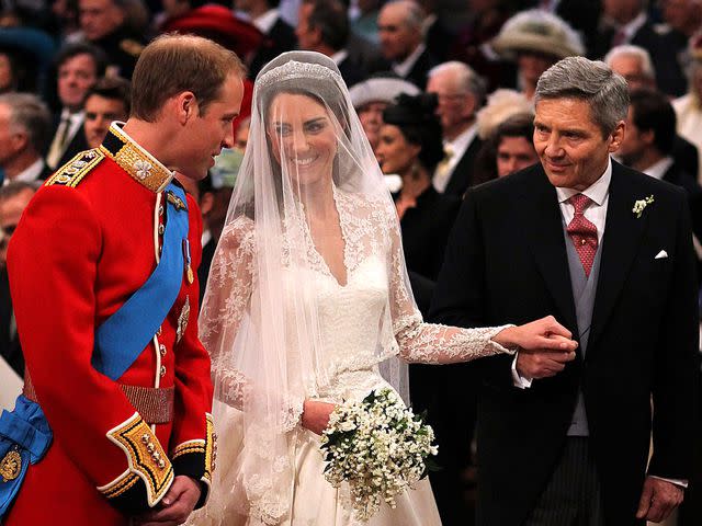 <p>Dominic Lipinski - WPA Pool/Getty</p> rince William, Catherine Middleton, and her father Michael Middleton at Westminster Abbey during the Royal Wedding in 2011.