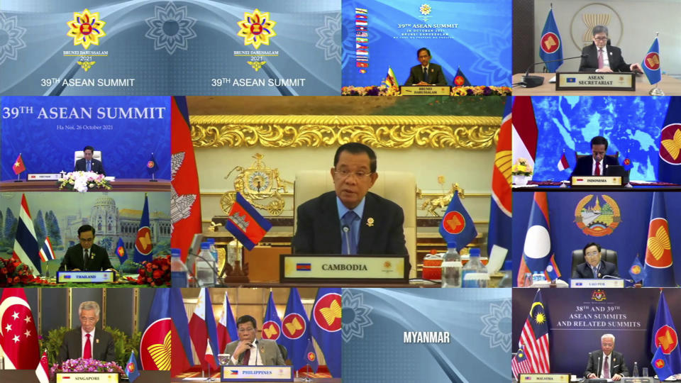 In this image released on Tuesday, Oct. 26, 2021, by Brunei ASEAN Summit in Bandar Seri Begawan, Cambodia's Prime Minister Hun Sen, center, speaks during a virtual summit with the leaders of the Association of Southeast Asian Nations (ASEAN) member​ states. Southeast Asian leaders began their annual summit without Myanmar on Tuesday amid a diplomatic standoff over the exclusion of the leader of the military-ruled nation from the group's meetings. An empty box of Myanmar is seen at bottom second from right. (Brunei ASEAN Summit via AP)