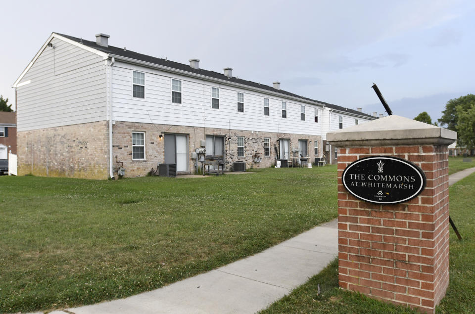 In this Monday, July 29, 2019, photo, townhouses stand at The Commons at White Marsh, owned by the Kushner Cos., in Middle River, Md. Jared Kushner’s family real estate firm owns thousands of apartments and townhomes in the Baltimore area, and some have been criticized for the same kind of disrepair and neglect that the president has accused local leaders of failing to address. (AP Photo/Steve Ruark)