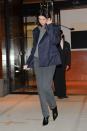 <p>The model wore grey suit trousers, a grey hoodie and a navy blue blazer, January 2018</p>