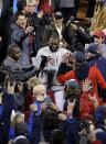 Boston Red Sox's David Ortiz celebrates after Game 6 of baseball's World Series against the St. Louis Cardinals Wednesday, Oct. 30, 2013, in Boston. The Red Sox won 6-1 to win the series. (AP Photo/Chris Carlson)