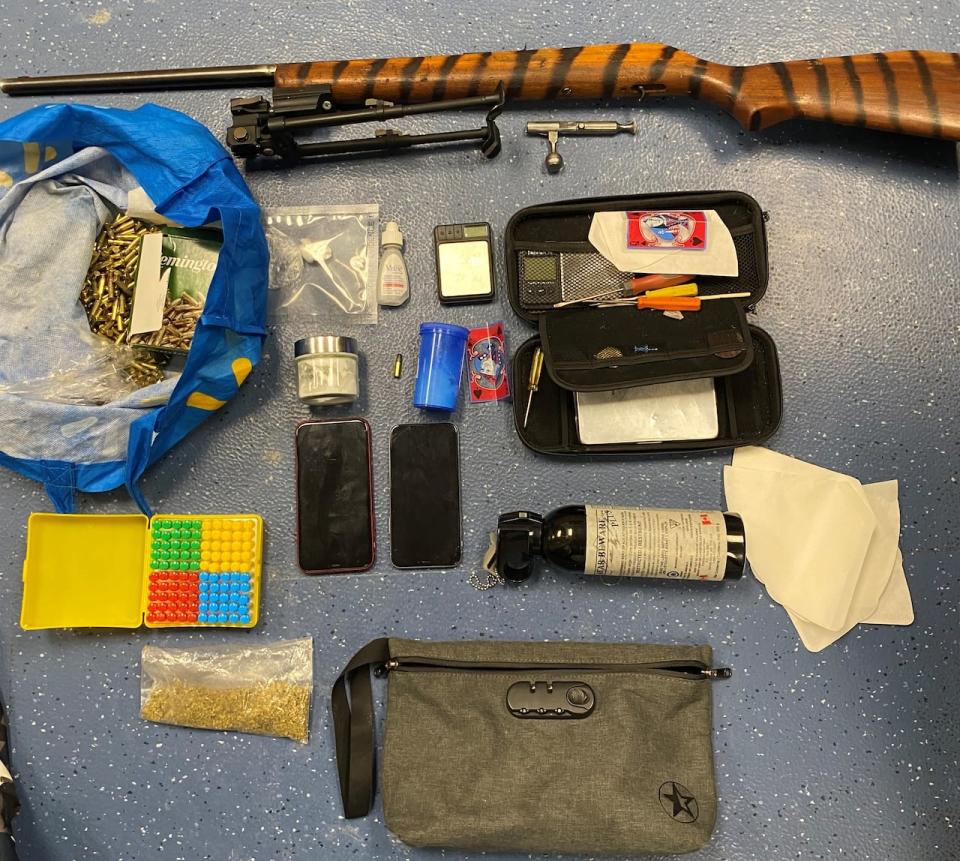 Hay River RCMP say they seized an illegal firearm and suspected cocaine from two people in the community on Wednesday.  (Submitted by N.W.T. RCMP - image credit)