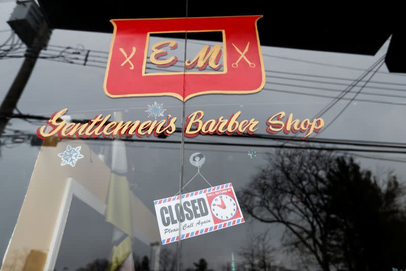 A closed barber shop is seen during the coronavirus outbreak in New Rochelle New York