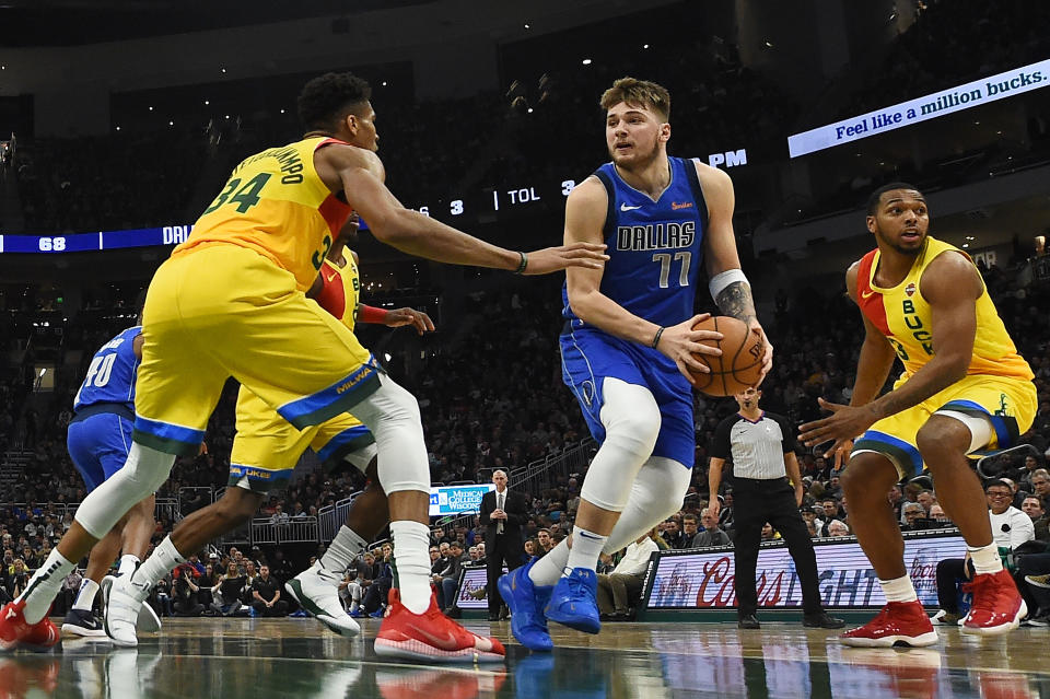 Luka Doncic and Giannis Antetokounmpo would be All-Star captains based on the first round of fan voting. (Stacy Revere/Getty Images)