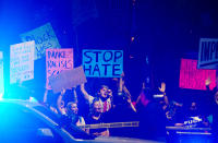 <p>Pro-Trump supporters face off with peace activists during protests outside a Donald Trump campaign rally in Phoenix, Arizona, U.S. August 22, 2017. (Sandy Huffaker/Reuters) </p>