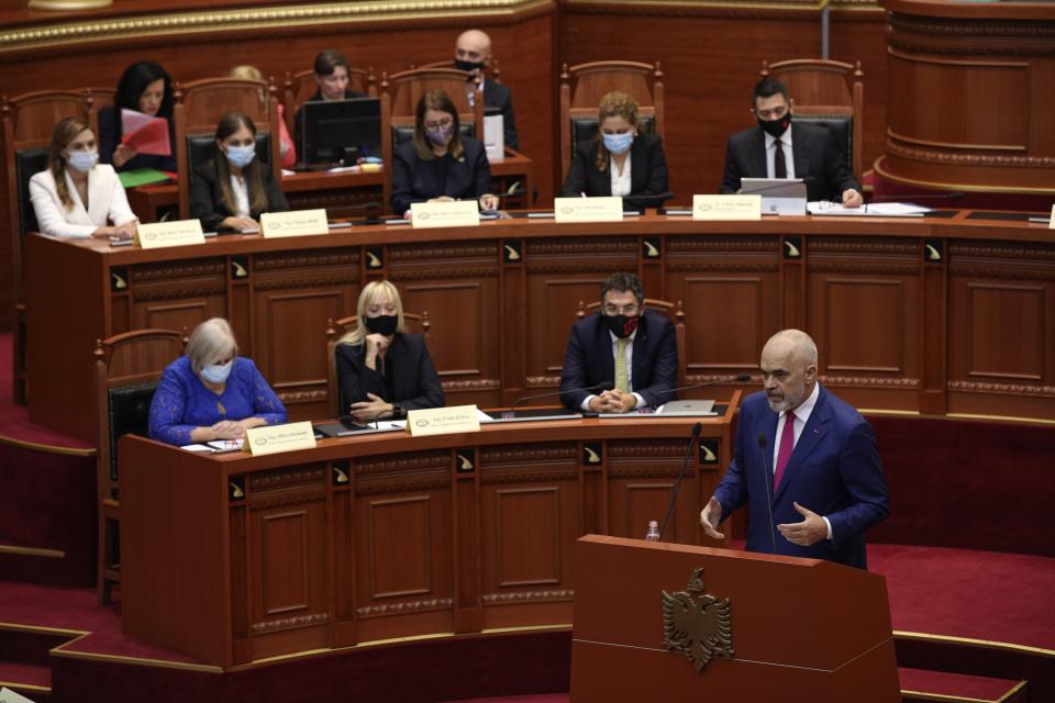 Albanian Prime Minister Edi Rama speaks during a debate at the parliament in Tirana, Albania, Thursday, Sept. 16, 2021. Albania's parliament was to vote late Thursday to approve the new, female-dominated Cabinet of Prime Minister Edi Rama, with 12 of the 17 jobs going to women, propelling Albania to the top of global rankings in terms of the percentage of women holding Cabinet positions. (AP Photo/Franc Zhurda)