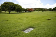 A grave marker for an unknown casualty from the USS Arizona is shown at the National Memorial Cemetery of the Pacific on Thursday, July 15, 2021 in Honolulu. Advances in DNA technology have allowed the U.S. military to exhume and identify the remains of hundreds of sailors and Marines buried as unknowns from the bombing of Pearl Harbor, decades after the 1941 attack that launched the U.S. into World War II. But the Defense POW/MIA Accounting Agency, which is responsible for locating and identifying missing servicemen and women, says it won't be able to do the same for those from the battleship that lost the most men that day: the USS Arizona. (AP Photo/Caleb Jones)